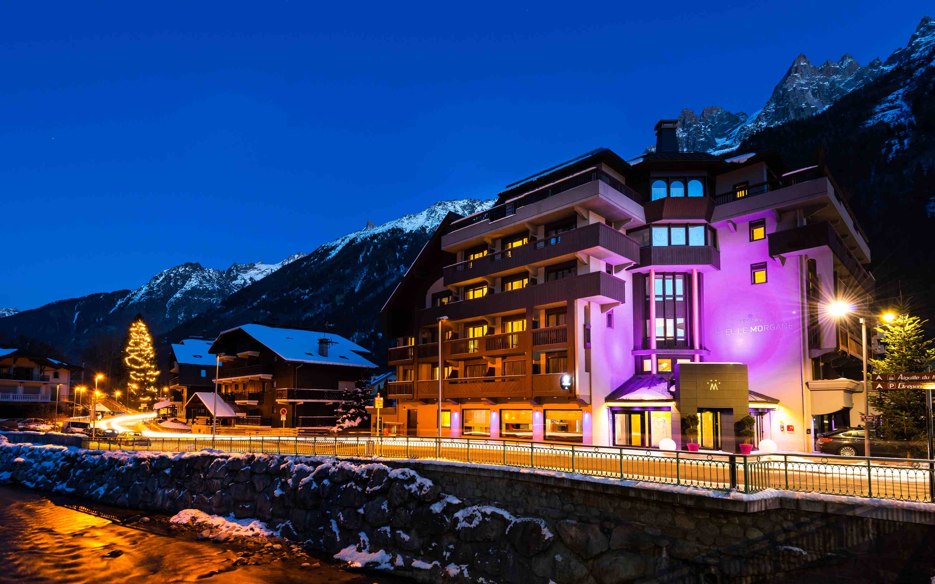 Exterior of Hotel Le Morgane in Chamonix at dusk