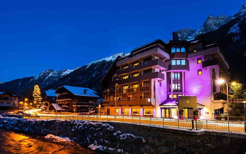 Exterior of Hotel Le Morgane in Chamonix at dusk